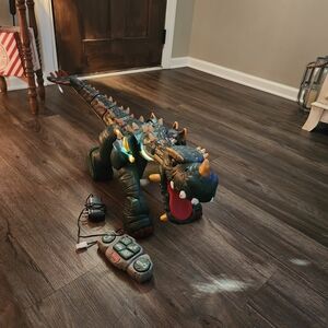 Fisher-Price Green and Yellow Dinosaur Toy